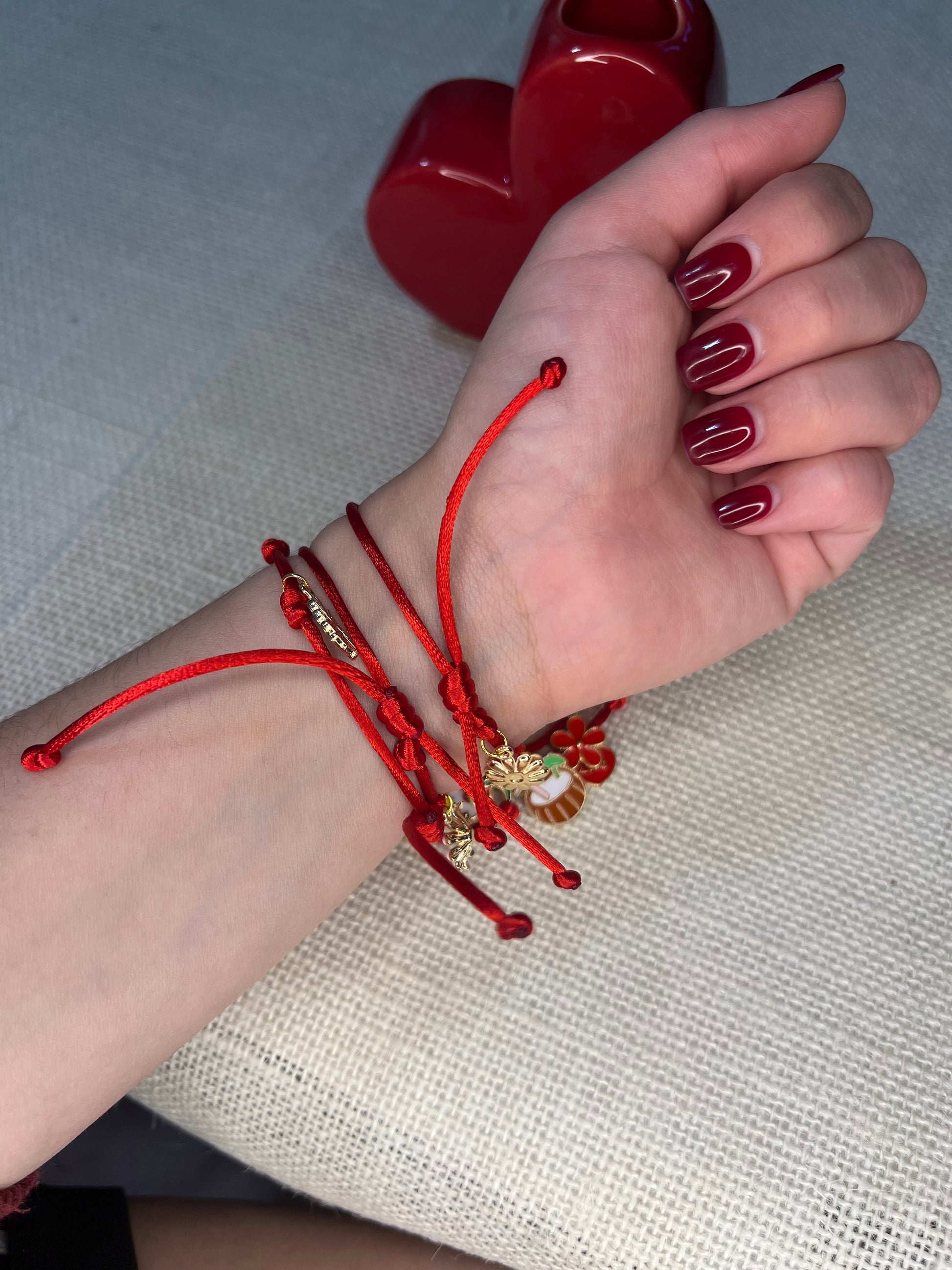 Random charm red bracelet