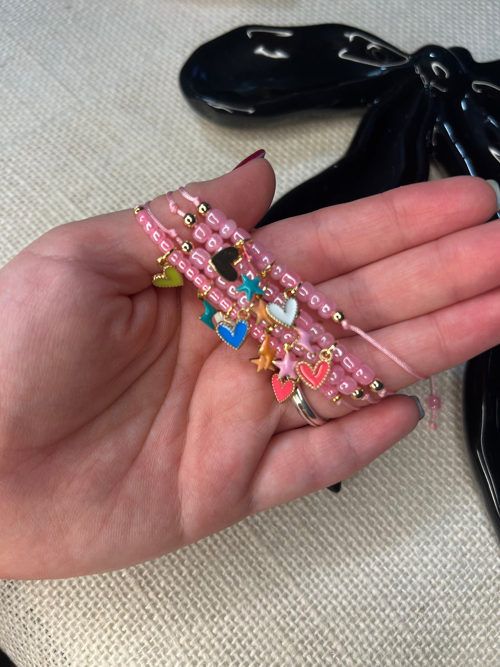Pink mini bracelet with tiny charms