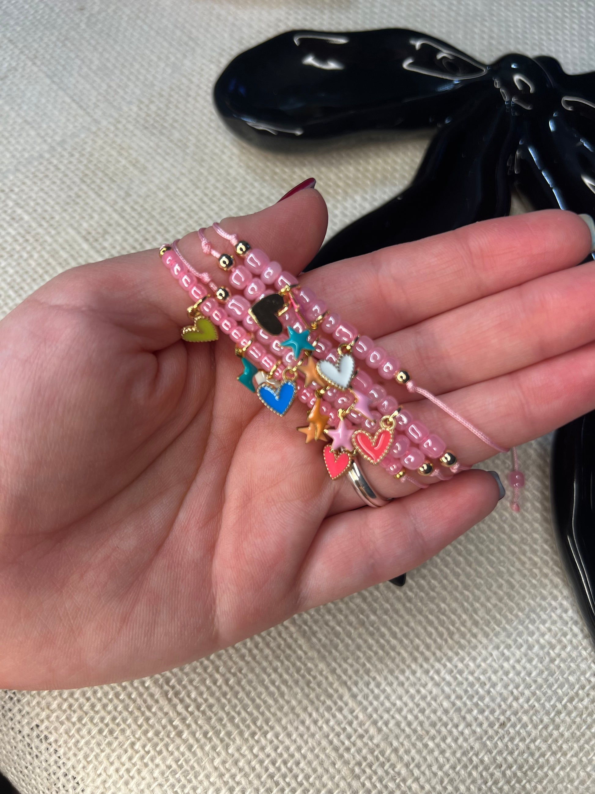 Pink mini bracelet with tiny charms