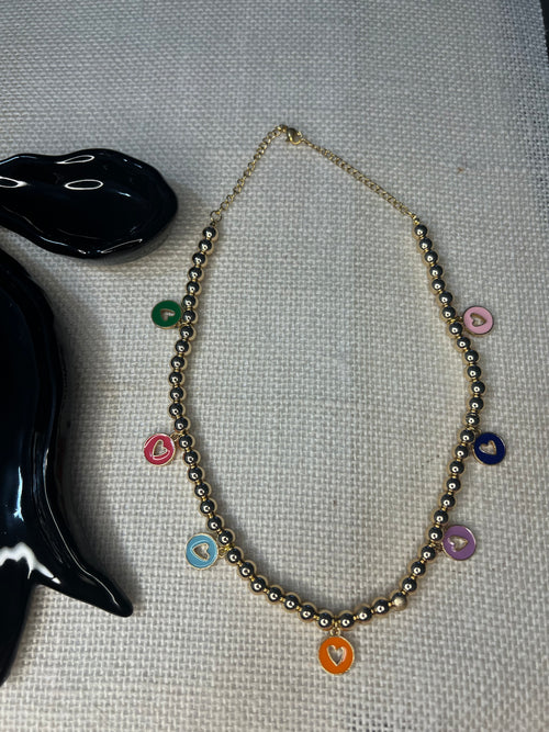Beaded necklace with circular heart