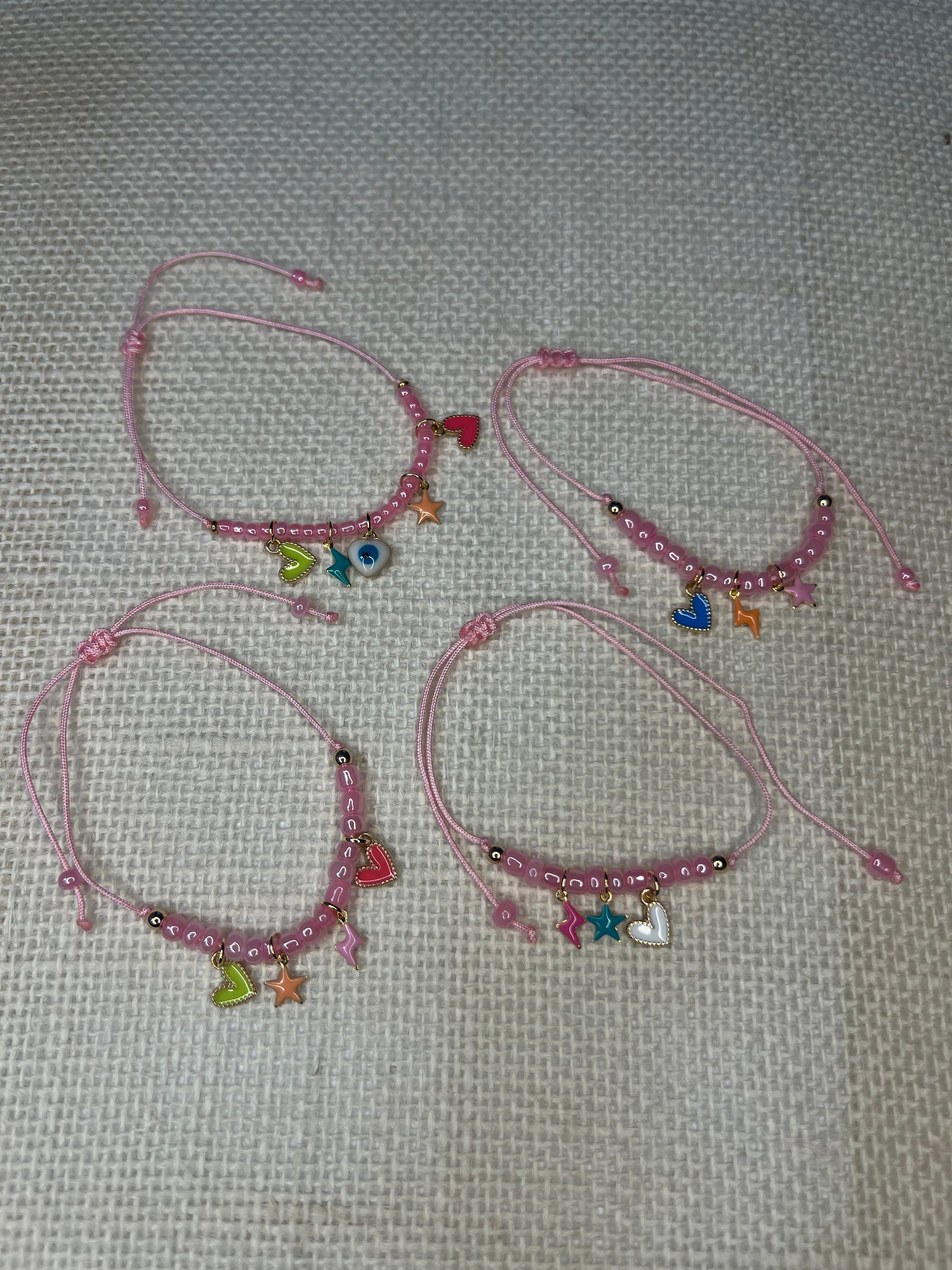 Pink mini bracelet with tiny charms