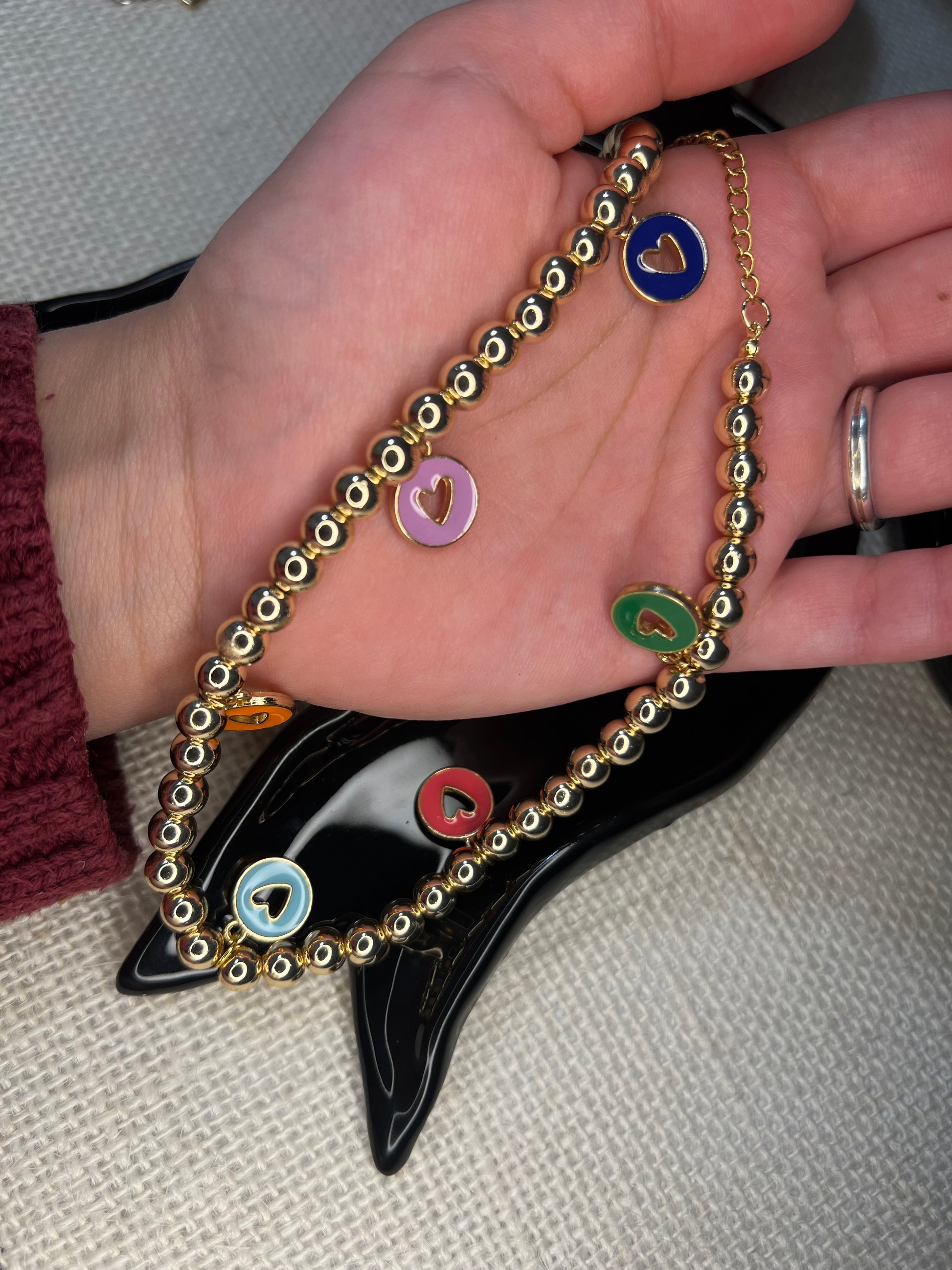 Beaded necklace with circular heart